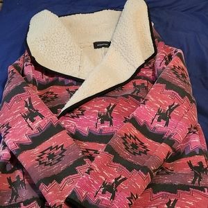 Warm, fuzzy, intricate jacket